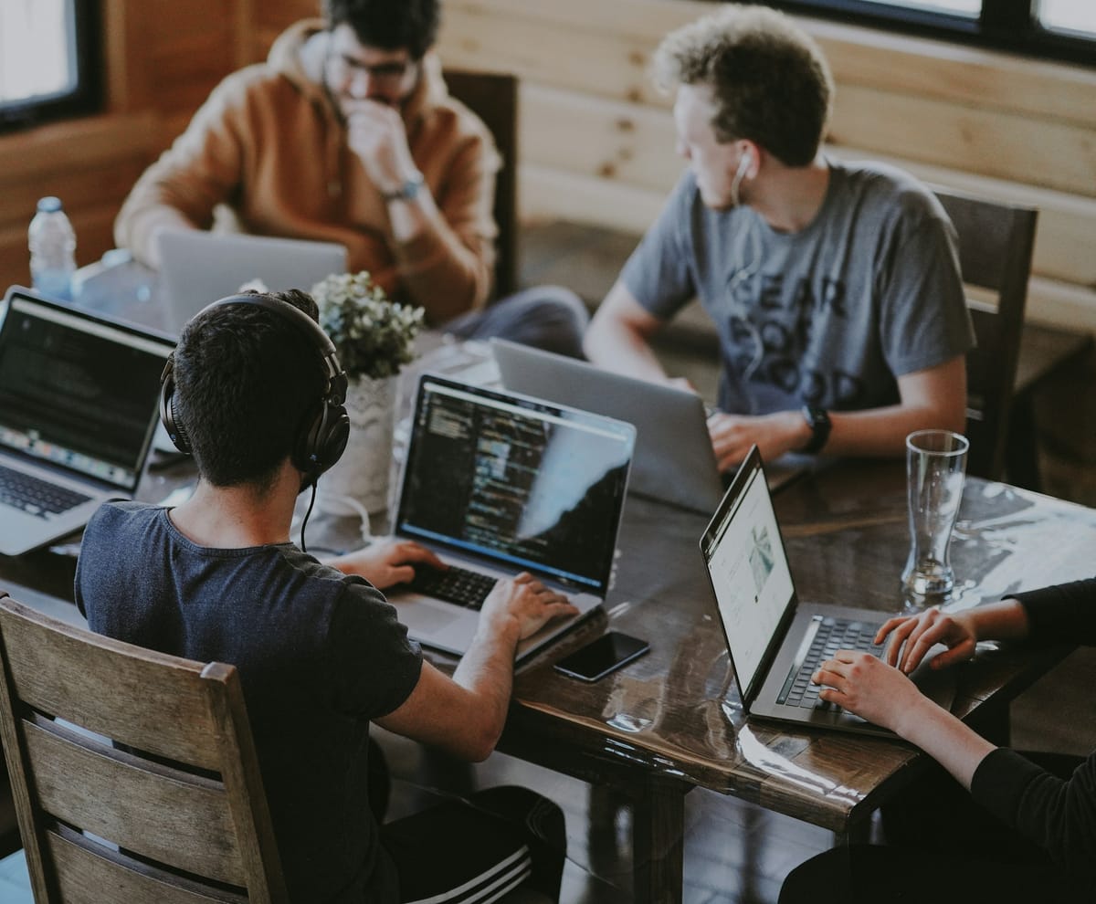 A software engineering team working in a modern office